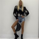 camicia semi trasparente con applicazioni bijoux